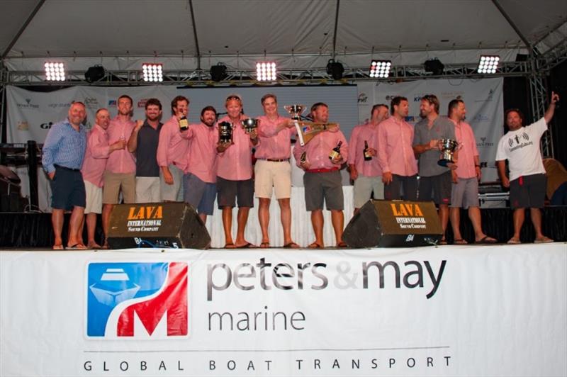 Warrior receiving 1st place awards on stage during 2018 Antigua Sailing Week photo copyright Ted Martin taken at Antigua Yacht Club