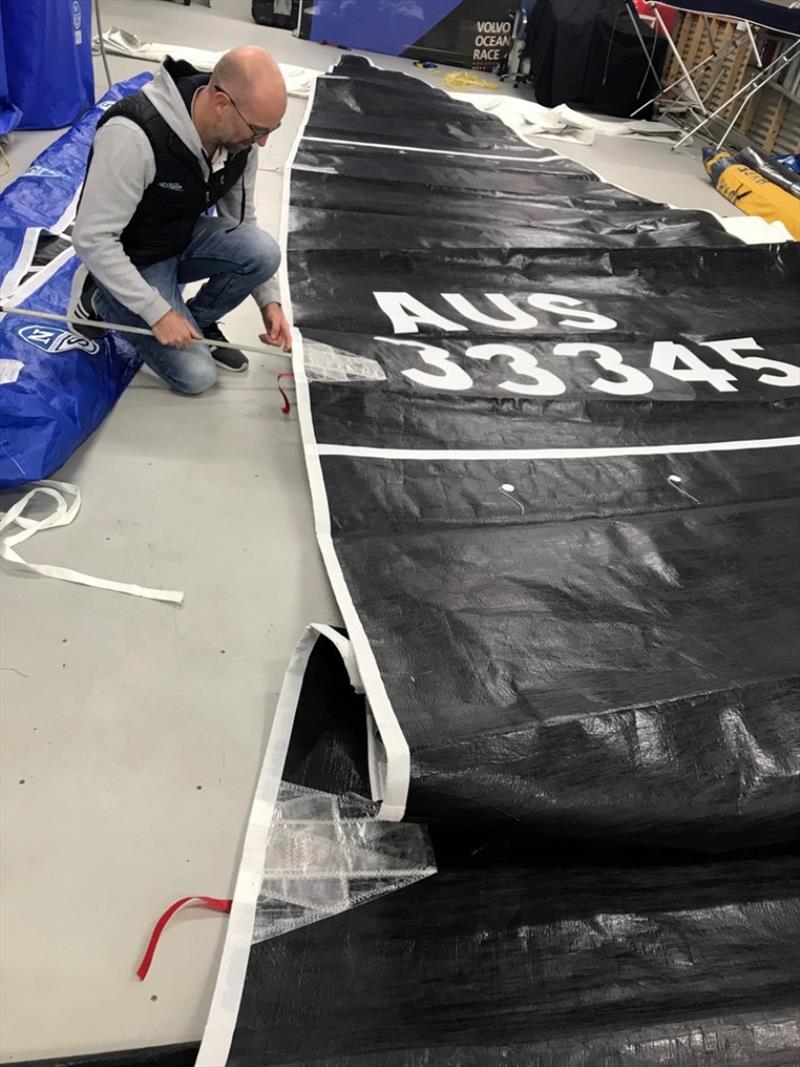 Stewart Gray checks a sail at the North Sails Loft at Cambridge, Tasmania photo copyright Stewart Gray taken at 