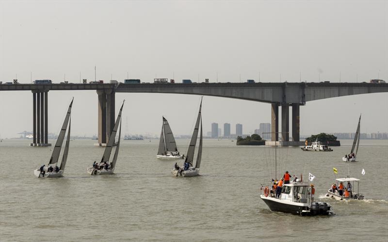 Racing under the The Tiger Gate Bridge. 2nd Guangzhou Nansha International Sailing Regatta  photo copyright Guy Nowell taken at 