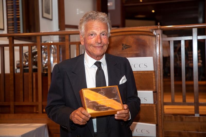 Atalanta II's Carlo Puri Negri accepts his trophy for winning the 2017-18 IMA Mediterranean Maxi Offshore Challenge photo copyright Gianfranco Forza taken at 