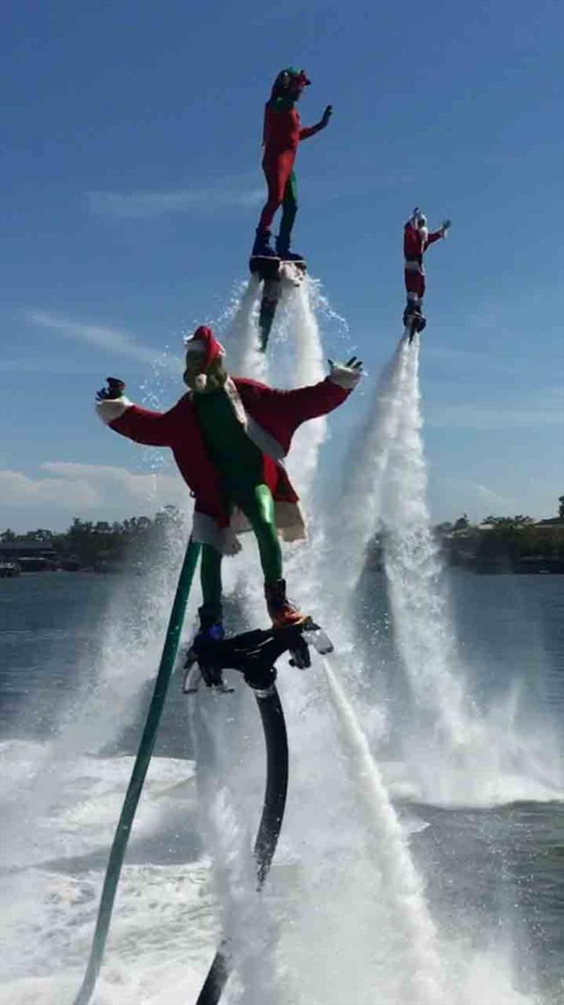 Santa arriving via JetPack Events, at Southport Yacht Club's 2017 Carols on the Broadwater celebrations at the Club's Main Beach Facility photo copyright Southport Yacht Club taken at 