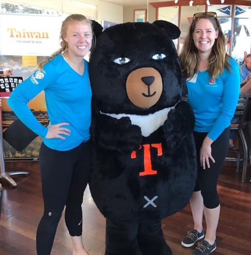 Adorable O'Bear was a popular party guest, here with Logan Ashcraft, left, and Collette Meyers, right - 2018 Red Bra Regatta photo copyright Kara Hugglestone / Sail Couture taken at South Beach Yacht Club