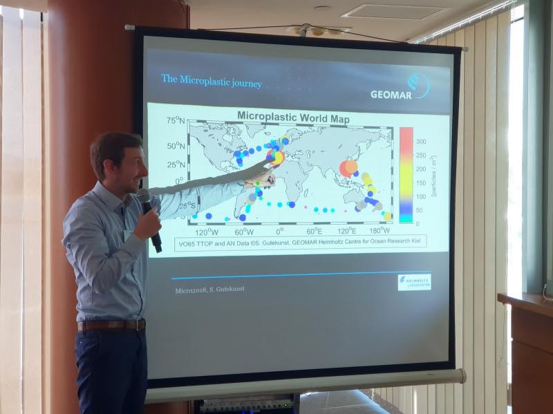 Scientist Soren Gutenkunst presenting microplastics data at MICRO2018 conference photo copyright Soren Gutenkunst taken at 