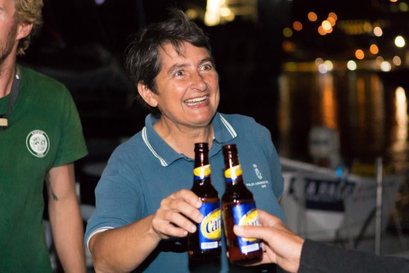 Catherine Pourre, Class40 Eärendil crew enjoy a cold beer after completing the 2018 RORC Transatlantic Race - photo © RORC / Arthur Daniel