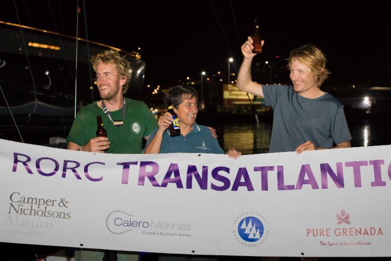 Team Eärendil: Gery Atkins, Catherine Pourre and Pietro Luciani - celebrating Class40 line honours - 2018 RORC Transatlantic Race photo copyright RORC / Arthur Daniel taken at Royal Ocean Racing Club