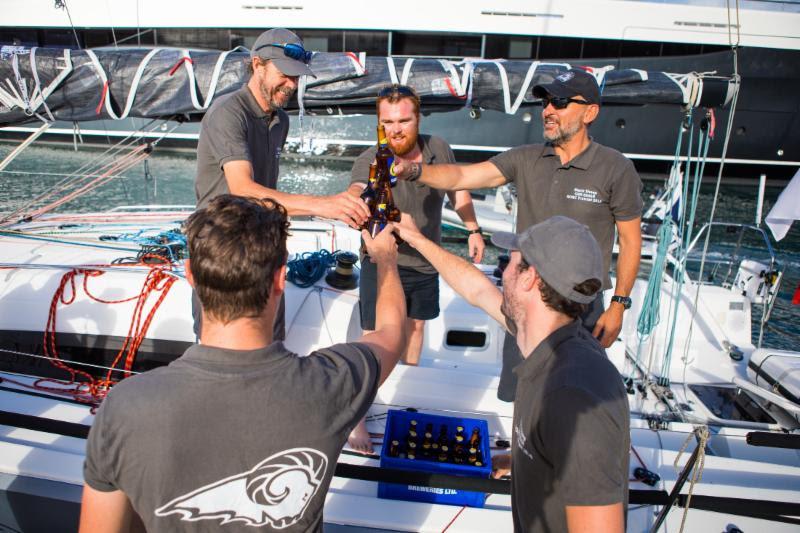 Enjoying ice cold beers on arrival, courtesy of C&N Port Louis Marina - 2018 RORC Transatlantic Race photo copyright RORC / Arthur Daniel taken at Royal Ocean Racing Club