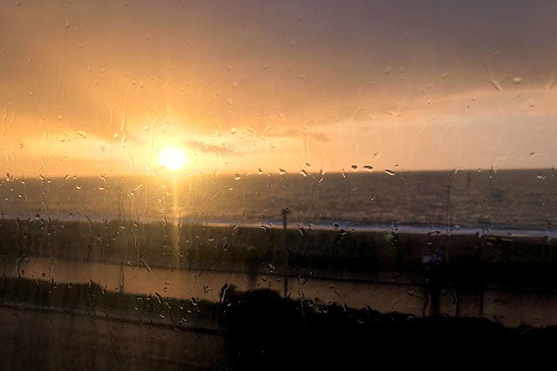Sunrise in the last of the rain from Storm Deirdre - photo © Vicky Cox
