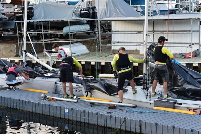 SB20 sailors tidying up after a warm evening on the River Derwent - photo © Jane Austin