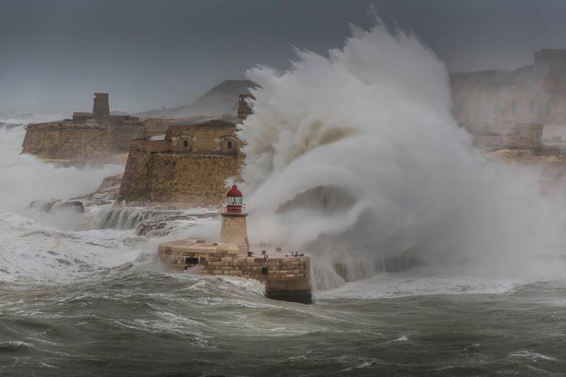 70kt storm hits Ricasoli Breakwater Lighthouse in Valletta, Malta. February 24, 2019 photo copyright Kurt Arrigo taken at Royal Malta Yacht Club