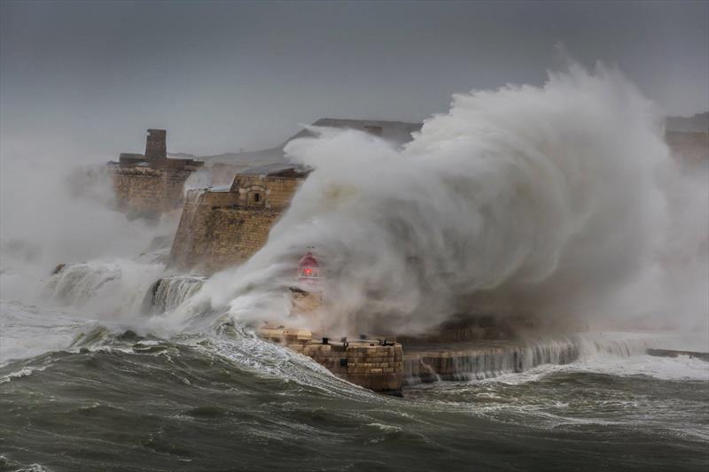 70kt storm hits Ricasoli Breakwater Lighthouse in Valletta, Malta. February 24, 2019 photo copyright Kurt Arrigo taken at Royal Malta Yacht Club