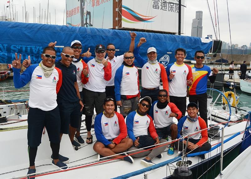 Ernesto Echauz is back row third from left with his crew from Standard Insurance Centennial - Inaugural Hong Kong to Puerto Galera Yacht Race photo copyright RHKYC / Naomi Rebecca taken at Royal Hong Kong Yacht Club