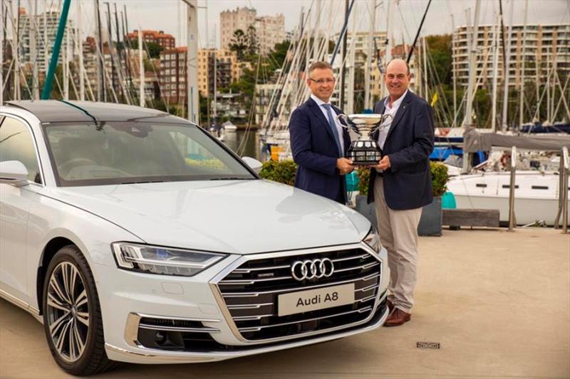 Audi Centre Sydney Blue Water Pointscore champion Matt Allen (right) and Audi Centre Sydney Dealer Principal Steve Cloete with the Jack Halliday Trophy and the all-new Audi A8 at the Cruising Yacht Club of Australia in Darling Point, Sydney photo copyright Cruising Yacht Club of Australia taken at Cruising Yacht Club of Australia