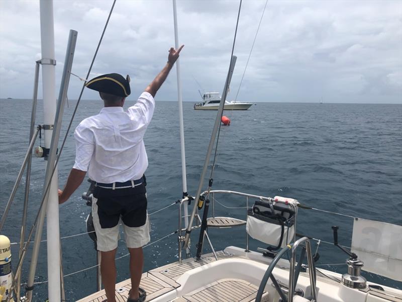 Saluting the committee boat, 'Reel Extreme' Denis from yacht Pretaixte photo copyright World Cruising Club taken at 