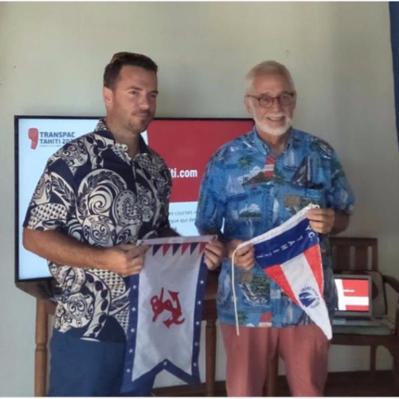 Tahiti YC Director Jessee Besson (left) and TPYC Vice Commodore Tom Trujillo (right) exchange burgees photo copyright Transpacific Yacht Club taken at Transpacific Yacht Club