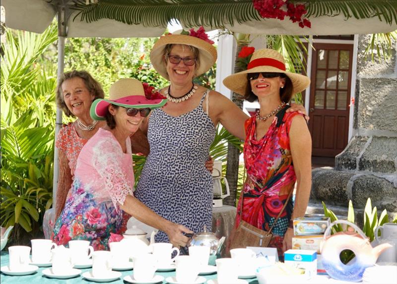 A bevy of volunteers dressed in blooming hats and garden dresses - Antigua Classic Yacht Regatta 2019 photo copyright Jan Hei taken at Antigua Yacht Club