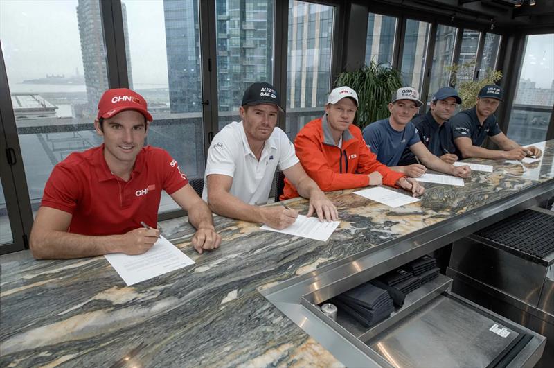 All six helmsmen sign the Sport for Climate Action Framework of the UN Climate Change photo copyright SailGP taken at 