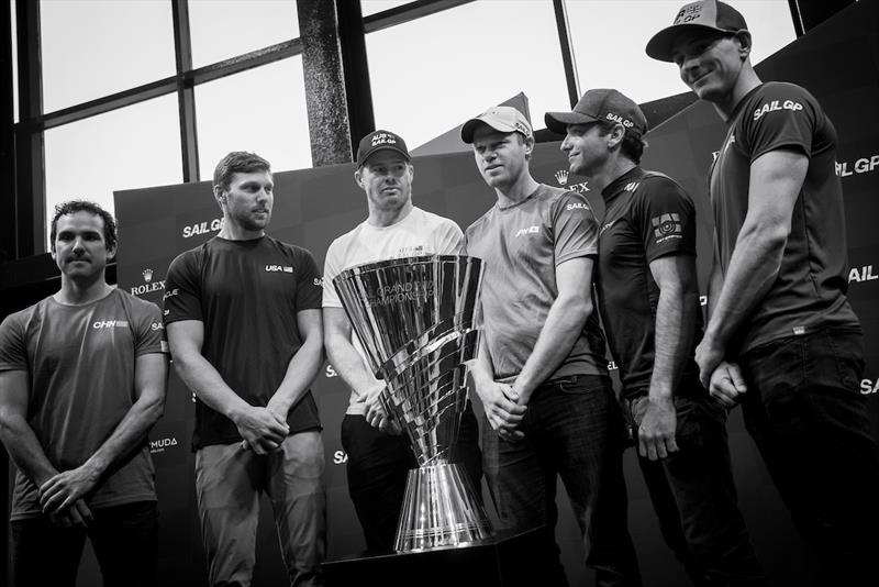 The six national SailGP helmsmen pose with the Championship Trophy (L to R) Phil Robertson CHN, Rome Kirby USA, Tom Slingsby AUS, Nathan Outteridge JPN, Billy Besson FRA and Dylan Fletcher GBR during a press conference in the Brookfield Place Atrium photo copyright Eloi Stichelbaut for SailGP taken at 