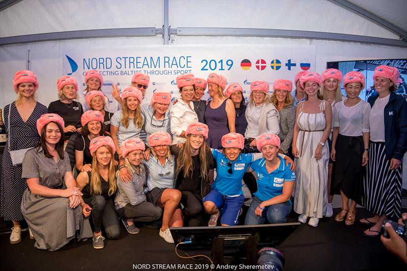 Race Dinner female sailors with pink hats photo copyright NSR / Andrey Sheremete taken at 