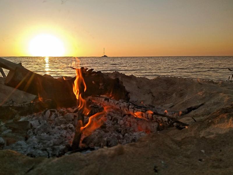 Fire on the beach in the Jardin de la Reina, with Contigo anchored behind photo copyright Mission Ocean taken at 