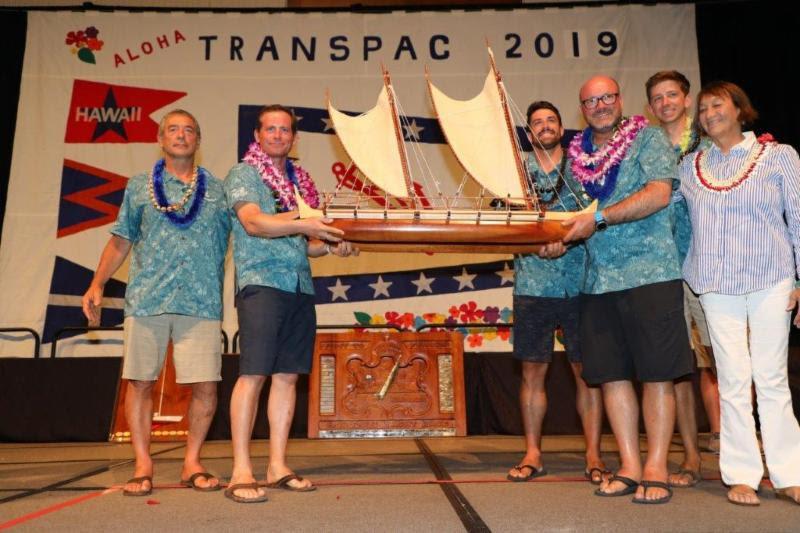 The crew of overall winners on Hamachi posing with the new King Kalakaua Trophy with trophy artist Ka'ili Chun (right) - Transpac 50 photo copyright Sharon Green / Ultimate Sailing taken at Transpacific Yacht Club