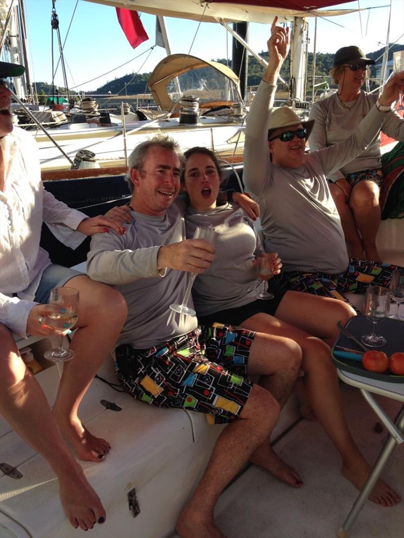 Peter Lowndes (sitting first on left) and crew singing 'We are the Champions' - SeaLink Magnetic Island Race Week, final day - photo © Di Pearson