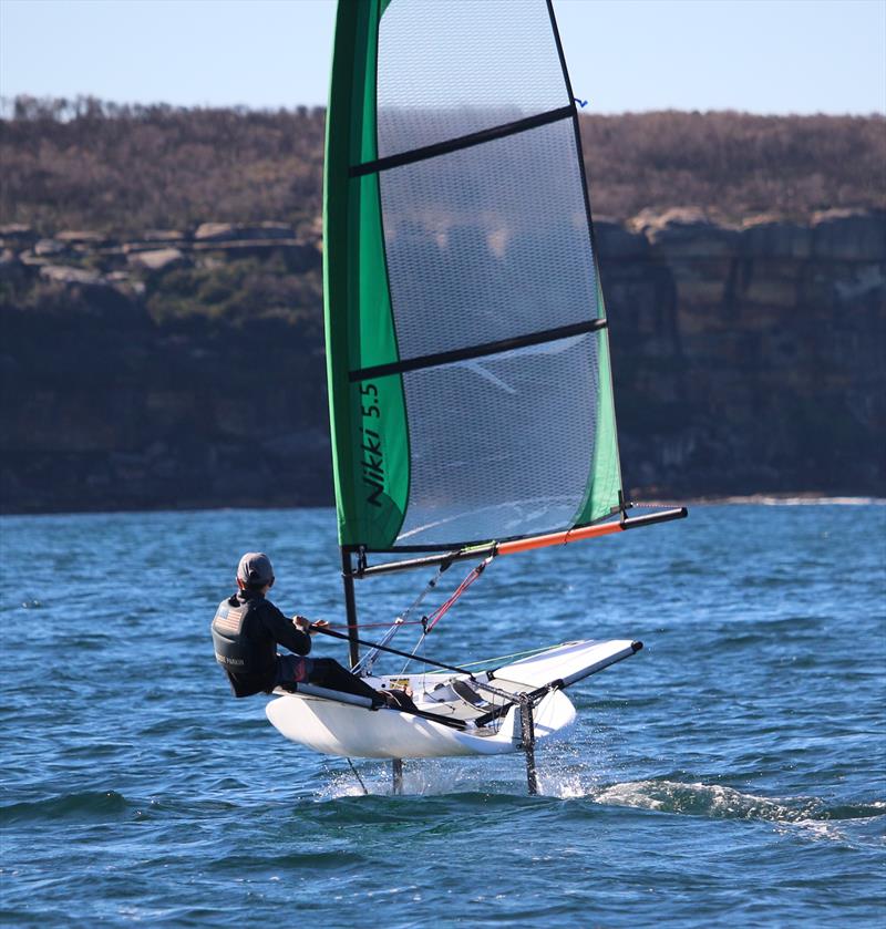 Nikki 5.5 foils downwind photo copyright Ian Ward taken at 