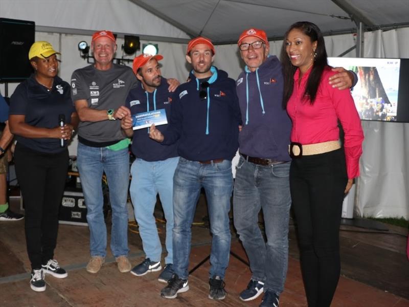 (L- R) Rana Lewis, Antigua Sailing Week; Team Mothership with skipper Max Rieger (3rd from left); Cherrie Osborne, The Antigua and Barbuda Tourism Authority. - photo © Antigua Sailing Week