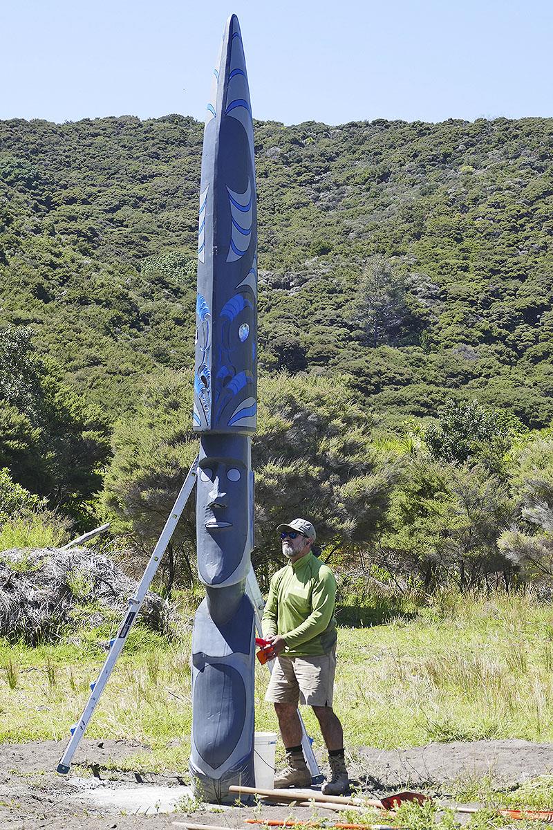 A DOC worker gives a final scrub and shine to new commemorative monument unveiled on November 7 at Mangahawea Bay. This cove was home to first settlers in New Zealand, explorers from Polynesia. It was also one of historic landfalls of Captain Cook in 1769 photo copyright Lisa Benckhuysen taken at 