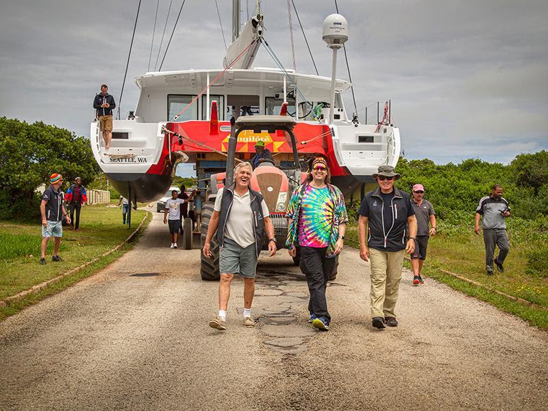 Johnny Paarman [L] and Roger Paarman [R] walk with the proud new owner of the Balance 526 `Vingilote` as they prepare for the splash. - photo © Balance Catamarans