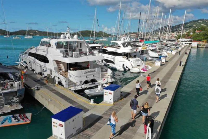 A few of the 140 charter yacht brokers attending the 2019 USVI Charter Yacht Show walk the docks at IGY's Yacht Haven Grande photo copyright Phil Blake taken at 