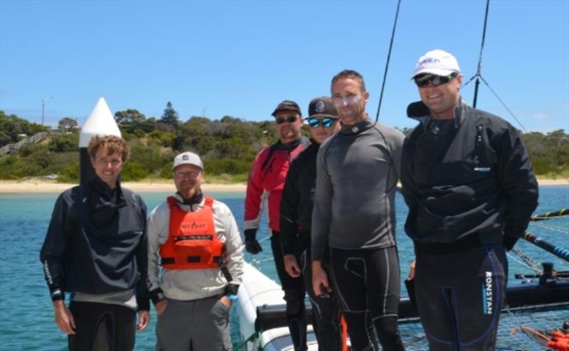 Back in Black owner Michael Van Der Zwaard (second from left) and crew at the finish of the ORCV Cock of the Bay. - photo © ORCV Media