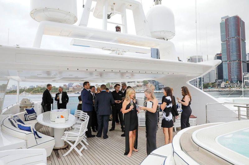 VIPs being treated to champagne onboard Ahoy Club's MY Mischief, Australia's largest domestic charter vessel photo copyright AIMEX taken at 