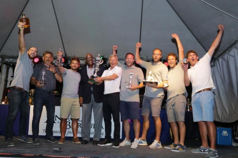 Tilmar Hansen and team on his TP52 Outsider win the RORC Caribbean 600 Trophy (1st IRC Overall) - the first German boat to do so in the 12-year history of the race photo copyright Tim Wright / photoaction.com taken at Antigua Yacht Club
