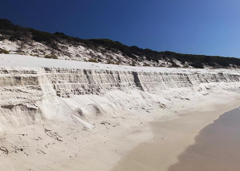 Sand cliffs on the beach at Middle Island photo copyright Wooden Boat Shop taken at 