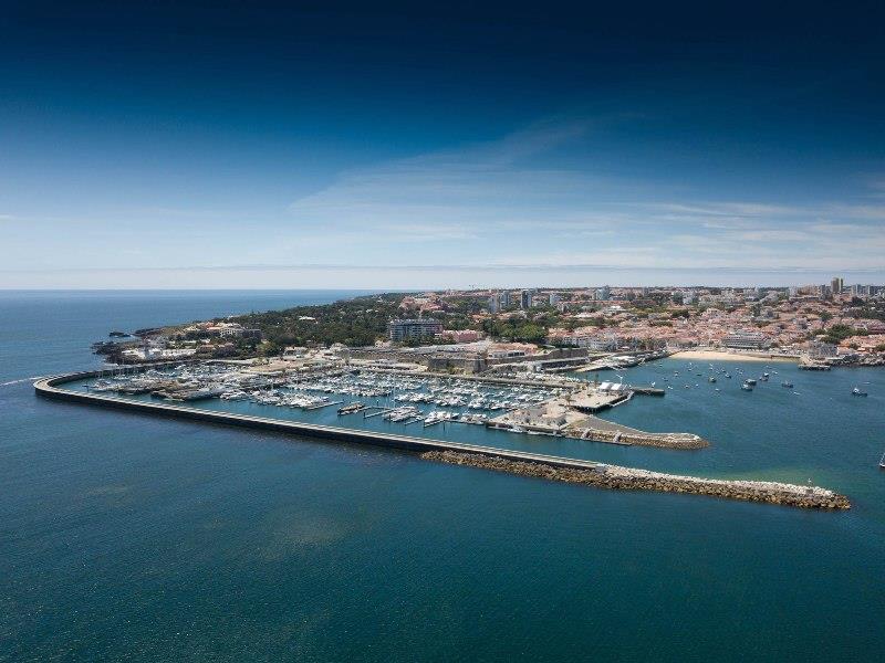 Star sailors and over 50 boats depart Cascais - photo © Marc Bow