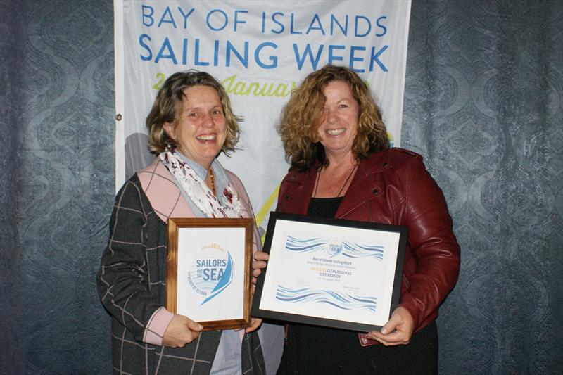Manuela Gmuer-Hornell (left) and Cath Beaumont (right) display the Gold Level Clean Regatta certification awarded to Bay of Islands Sailing Week. - photo © BOISW