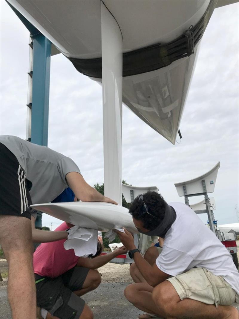 The team puts the finishing touches on Flying Jenny's speed-kote photo copyright Oakcliff Sailing taken at 