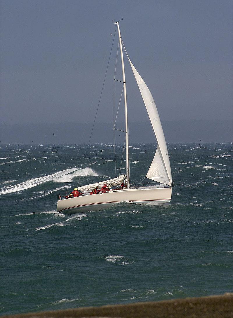 The Sydney 38 Mille Sabords (Blistering Barnacles) arrives at the finish line off Stanley - and yes it was blowing dogs off chains photo copyright John Curnow taken at 