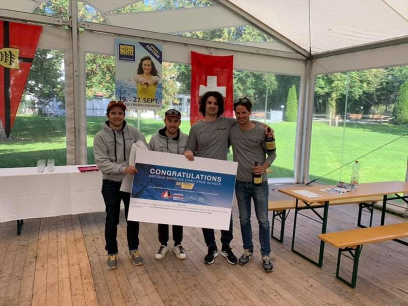 Swiss team displays their voucher during afternoons prizes at the Württembergischer Yacht Club photo copyright Antigua Sailing Week taken at 