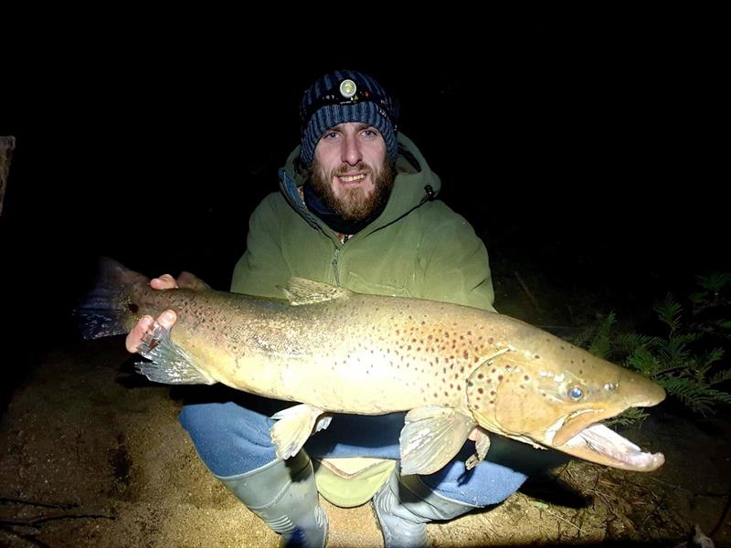 Jason Hales with Fishcake caught brown trout photo copyright Carl Hyland taken at 