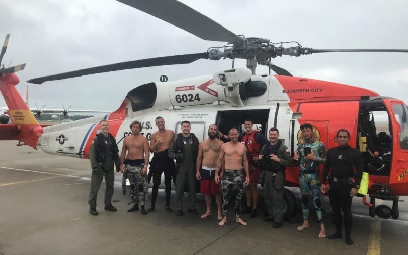 US Coast Guard Fifth District Command Center personnel with the fishermen saved this summer off Cape Henry photo copyright U.S. Coast Guard taken at 