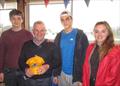 © John Sproat Willie the Cadet Hero, presented with the most appropriate gold medal (cap!) with then Cadet Captains (l to r) Hamish Williams, Huw Williams and Philippa Howie © John Sproat