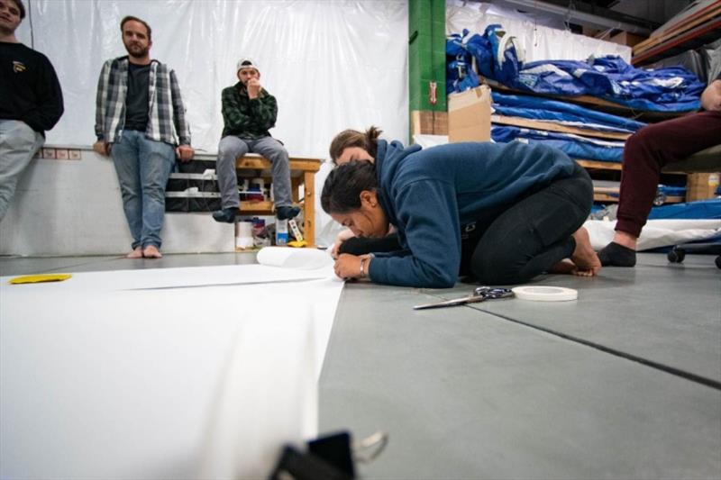 Winter Saplings work on making new jibs for Oakcliff's Melges 24 Doublehanded Offshore Race with Sail Loft Manager Chris Holman photo copyright Oakcliff Sailing taken at Oakcliff Sailing Center