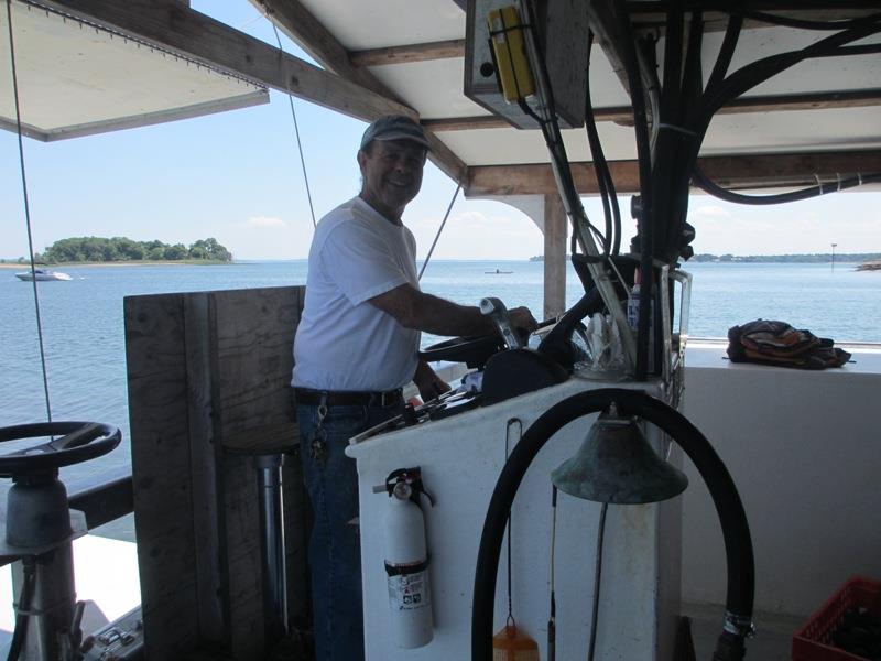 The owner of Atlantic Clam Farms, Ed Stilwagen, on his boat. - photo © NOAA Fisheries