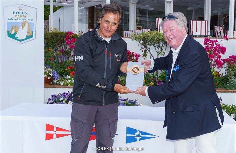 Fra Diavolo owner Vincenzo Addessi receives the prize for winning the Maxi Yacht Capri Trophy from International Maxi Associatino Secretary General Andrew McIrvine photo copyright ROLEX / Studio Borlenghi taken at Yacht Club Italiano