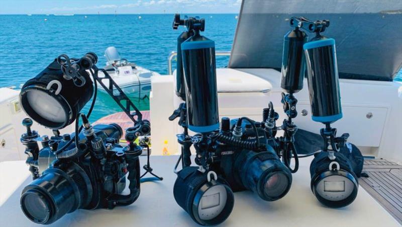 The underwater camera rigs ready for adventure, and within easy reach are the scuba tanks located in the cockpit storage lockers photo copyright Riviera Australia taken at 
