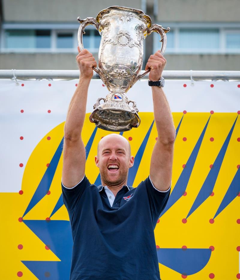 The Roosevelt Cup for the best of all athletes in terms of points in the second part of the Kieler Woche goes to iQ Foilsurfer Sebastian Kördel, who is as happy as he is deserving photo copyright Sascha Klahn taken at Kieler Yacht Club