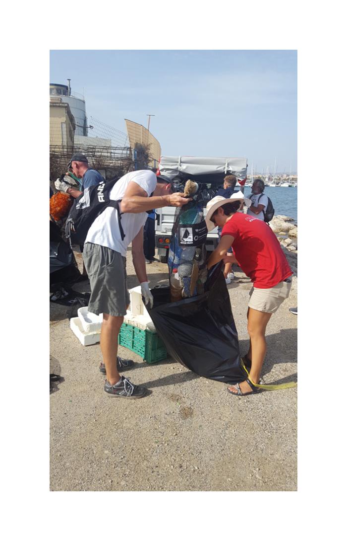 OCC members take coastal cleanup action photo copyright Phil Heaton taken at Ocean Cruising Club