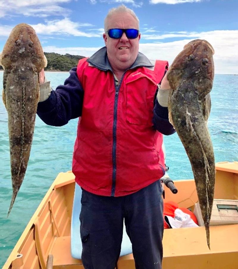 Peter Simmons with flathead photo copyright Carl Hyland taken at 
