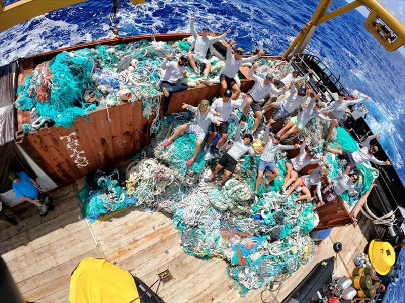 The team takes a well-earned rest after removing close to 124,000 pounds of marine debris photo copyright NOAA Fisheries / James Morioka taken at 